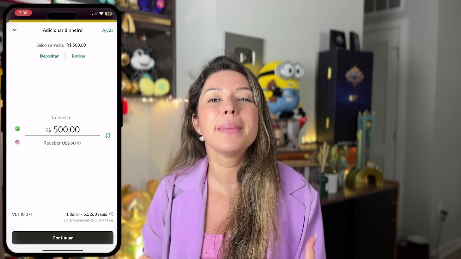 Tela do app da conta em dólar convertendo R$ 500 pelo câmbio comercial