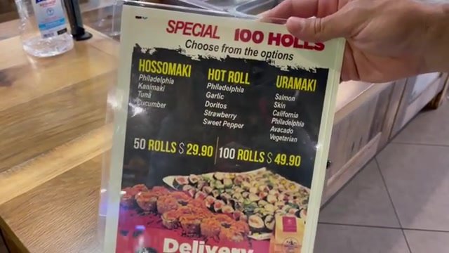 Cartaz da promoção do American Japa Sushi: Special 100 Rolls, 50 rolls por US$ 29,90 e 100 rolls por US$ 49,90