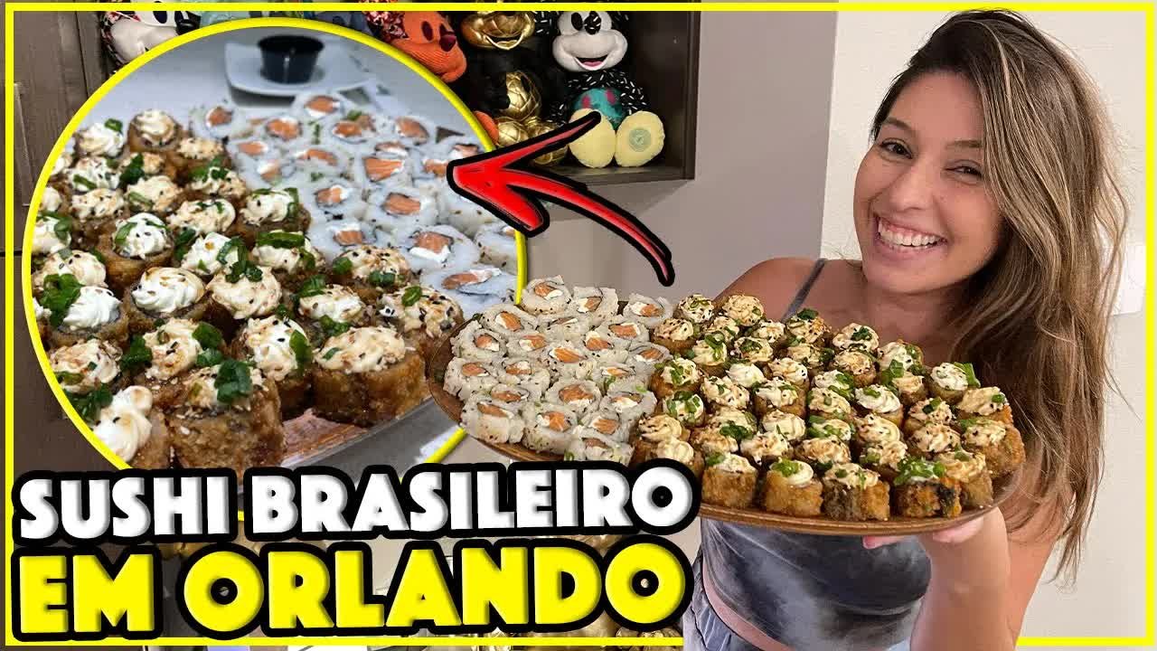 American Japa Sushi em Orlando: Gabi segurando a bandeja com as 100 peças de sushi brasileiro da promoção