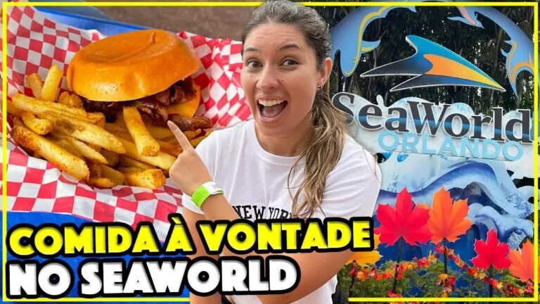 Gabi com a pulseira verde do plano de alimentação e um hambúrguer com batata no SeaWorld de Orlando