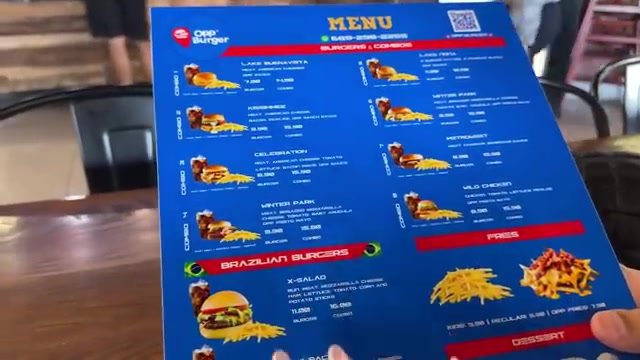Cardápio do Opp Burger com os hambúrgueres com nomes de bairros de Orlando e os preços de lanche e combo